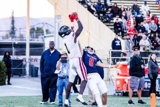 Darvens Joseph of Fairfax makes the winning 32-yard touchdown catch in overtime for a 20-14 win 