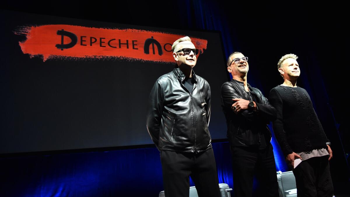 Andrew Fletcher, from left, Dave Gahan and Martin Gore of Depeche Mode in Milan.