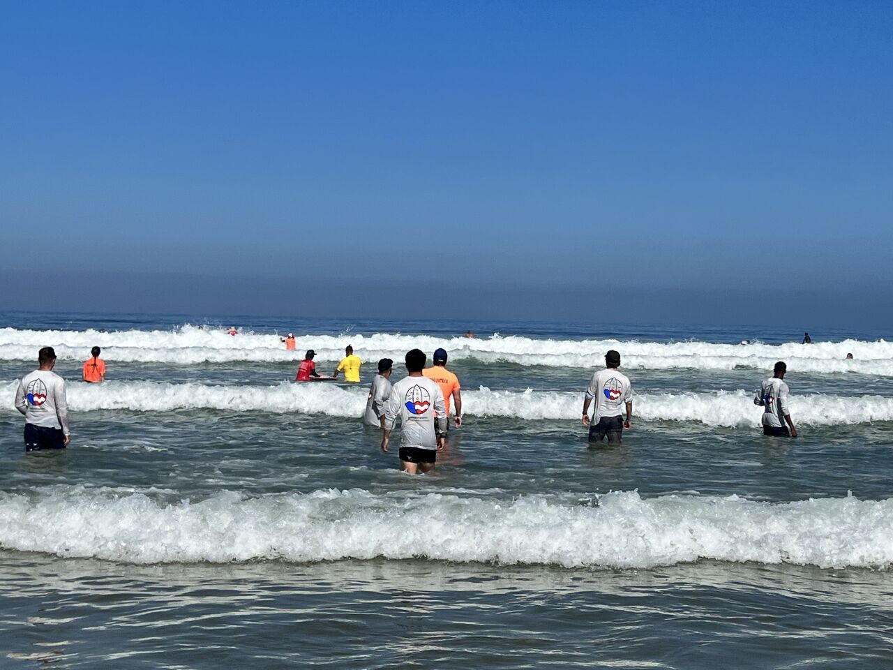 Veterans and volunteers from all over the country gather to surf at La Jolla Shores during the National Veterans Summer Sports Clinic.