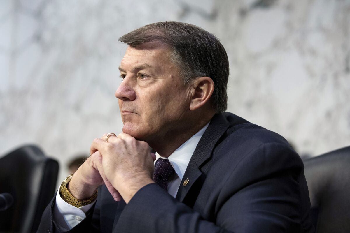 FILE - Sen. Mike Rounds, R-S.D., listens to testimony during a Senate Foreign Relations Committee meeting at the Capitol in Washington, on Thursday, Aug. 5, 2021. On Monday, Jan. 10, 2022, Rounds said he stands by his statement that Donald Trump lost the 2020 election after Trump called his fellow Republican a "jerk" for saying so. (AP Photo/Amanda Andrade-Rhoades, File)