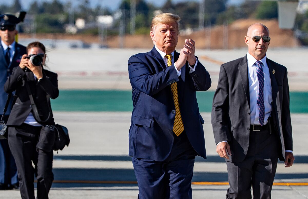 President Trump arrives at Los Angeles International Airport on Tuesday.