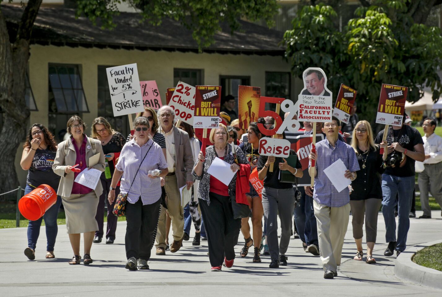 Faculty union members at Cal Poly Pomona, part of the Cal State system, practiced marching through campus in the days leading up to a scheduled strike last month. The strike was canceled after a last-minute deal was struck between union and university leaders.