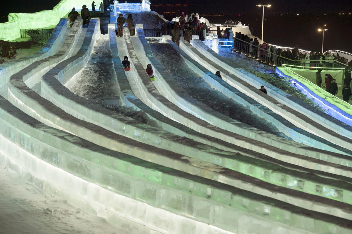Ice slides at the Harbin International Ice and Snow Sculpture Festival.
