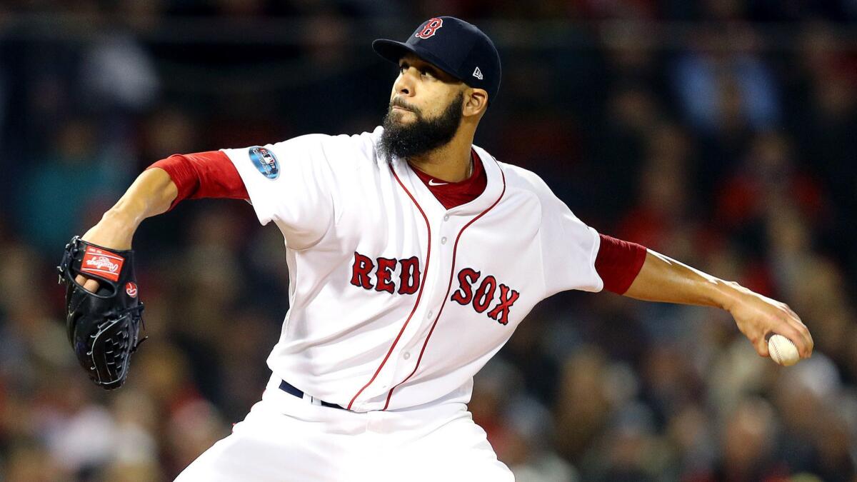 Boston Red Sox pitcher David Price delivers the pitch during the first inning against the Houston Astros in Game 2 of the American League Championship Series at Fenway Park on Sunday in Boston.