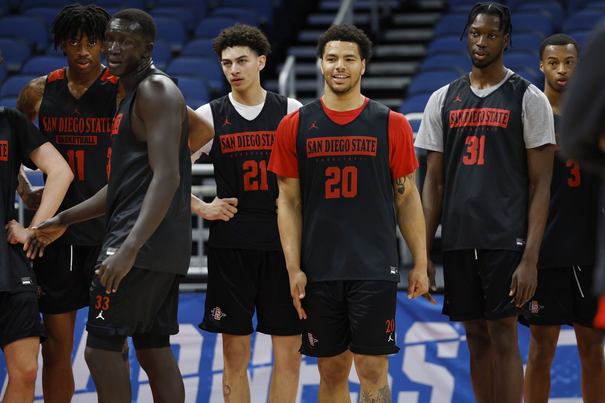 San Diego State's team looks on during Wednesday's practice at the Amway Center in Orlando, Fla.