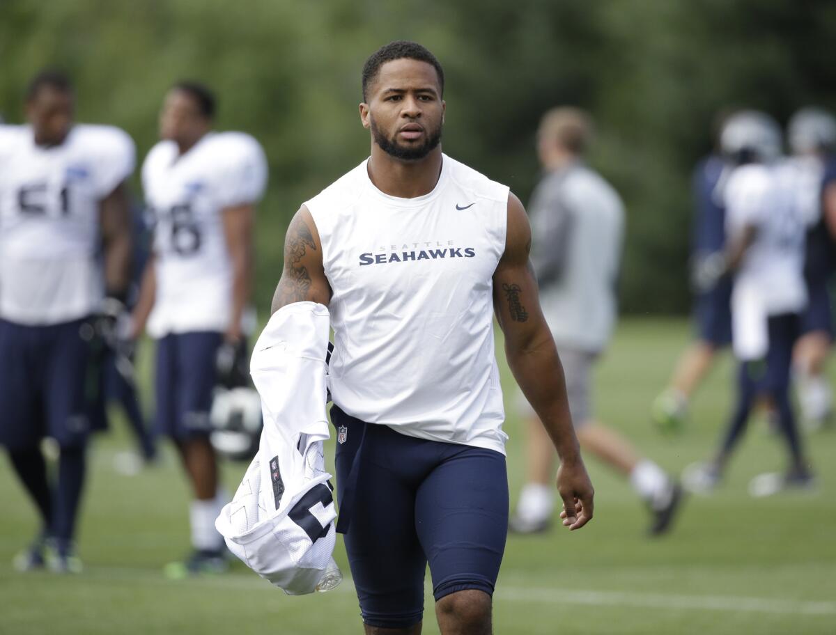Seahawks All-Pro safety Earl Thomas walks off the field after a training camp practice in Renton, Wash.
