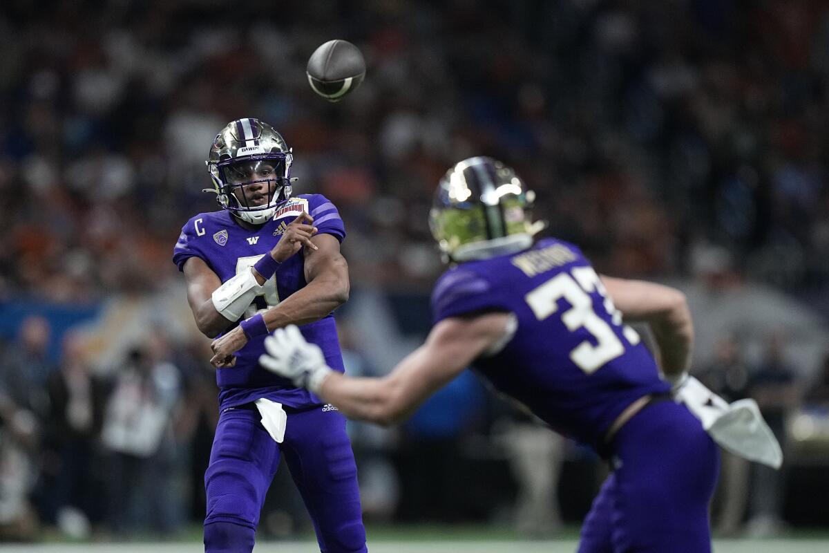 Washington quarterback Michael Penix Jr. throws against Texas in the Alamo Bowl on Dec. 29.