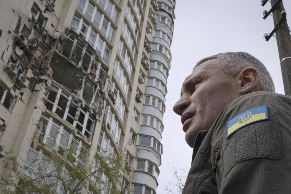 Kyiv mayor in front of apartment building damaged by drone attack