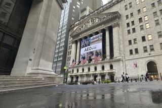 The New York Stock Exchange, with a banner for American Eagle Outfitters, is shown on Tuesday, Sept. 17, 2024, in New York. (AP Photo/Peter Morgan)