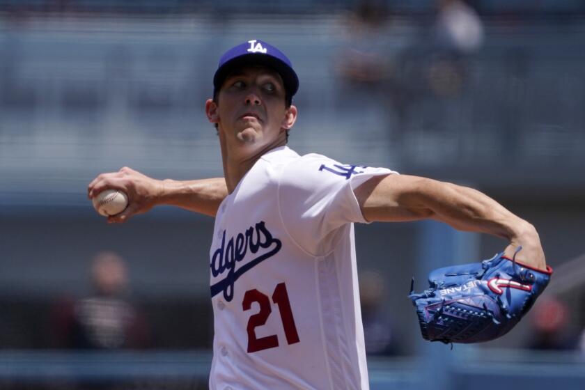 Los Angeles Dodgers starting pitcher Walker Buehler throws to the plate during the first inning of a baseball game against the Arizona Diamondbacks Wednesday, May 18, 2022, in Los Angeles. (AP Photo/Mark J. Terrill)