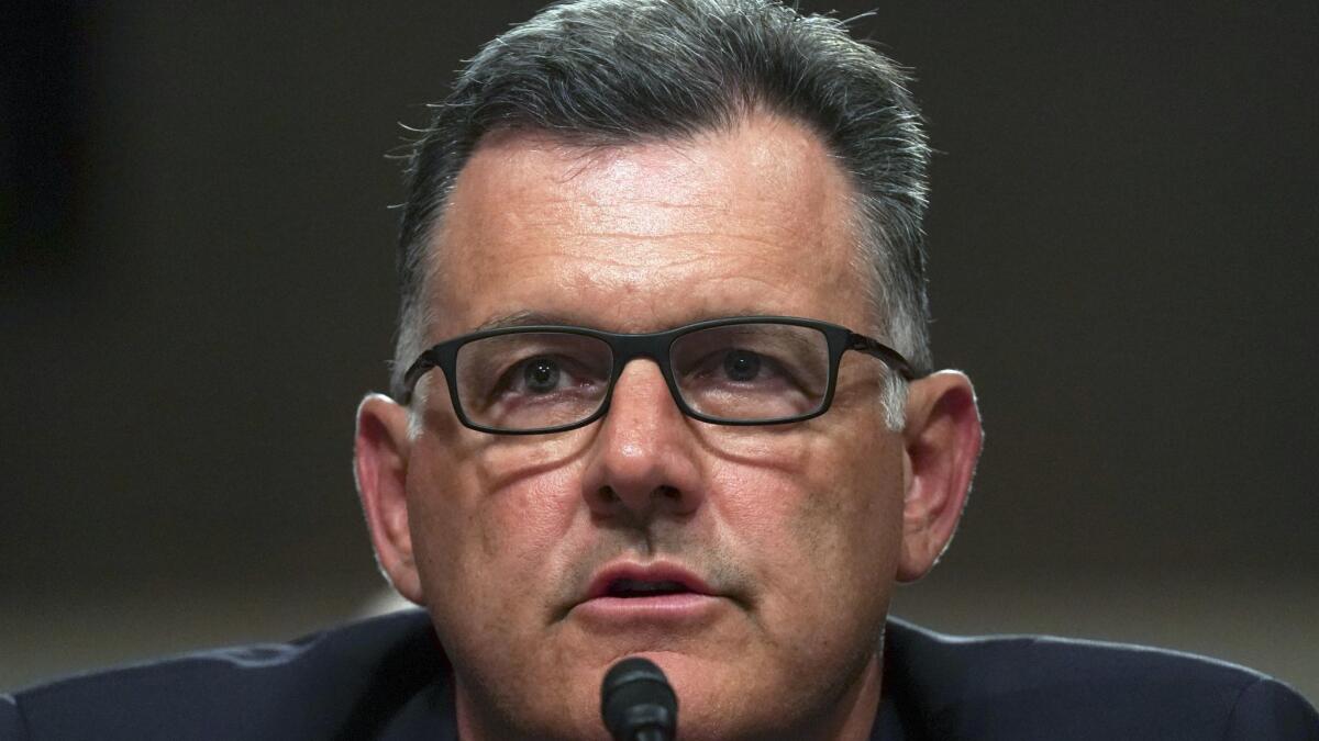 Former USA Gymnastics president Steve Penny invokes his right under the Fifth Amendment not to answer questions during a Senate Subcommittee on Consumer Protection, Product Safety, Insurance, and Data Security, on Capitol Hill in Washington.
