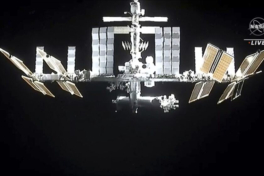 In this image from video provided by NASA, the International Space Station is seen as astronauts in the SpaceX Dragon capsule undock on Monday, Nov. 8, 2021, (NASA via AP)