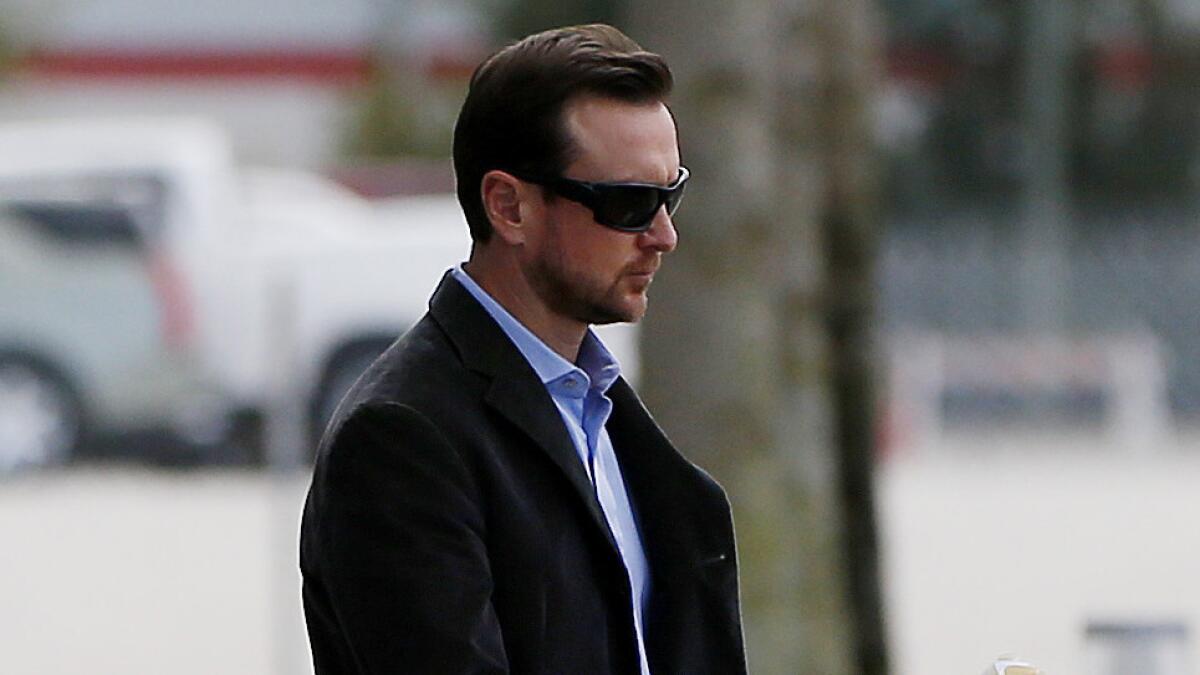 NASCAR driver Kurt Busch leaves the International Motorsports Center in Daytona Beach, Fla., after a NASCAR suspension appeals hearing on Feb. 21.