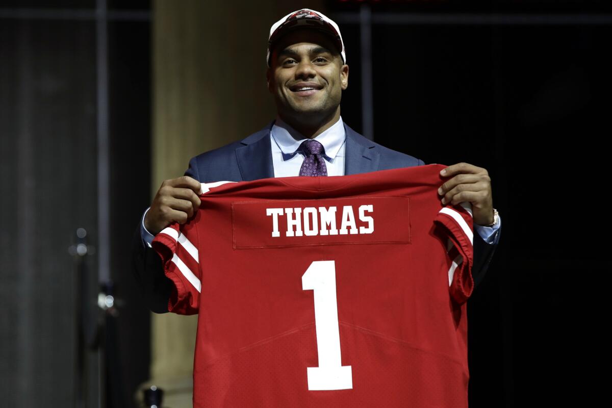Defensive end Solomon Thomas poses after being selected by the San Francisco 49ers with the third selection of the NFL draft.