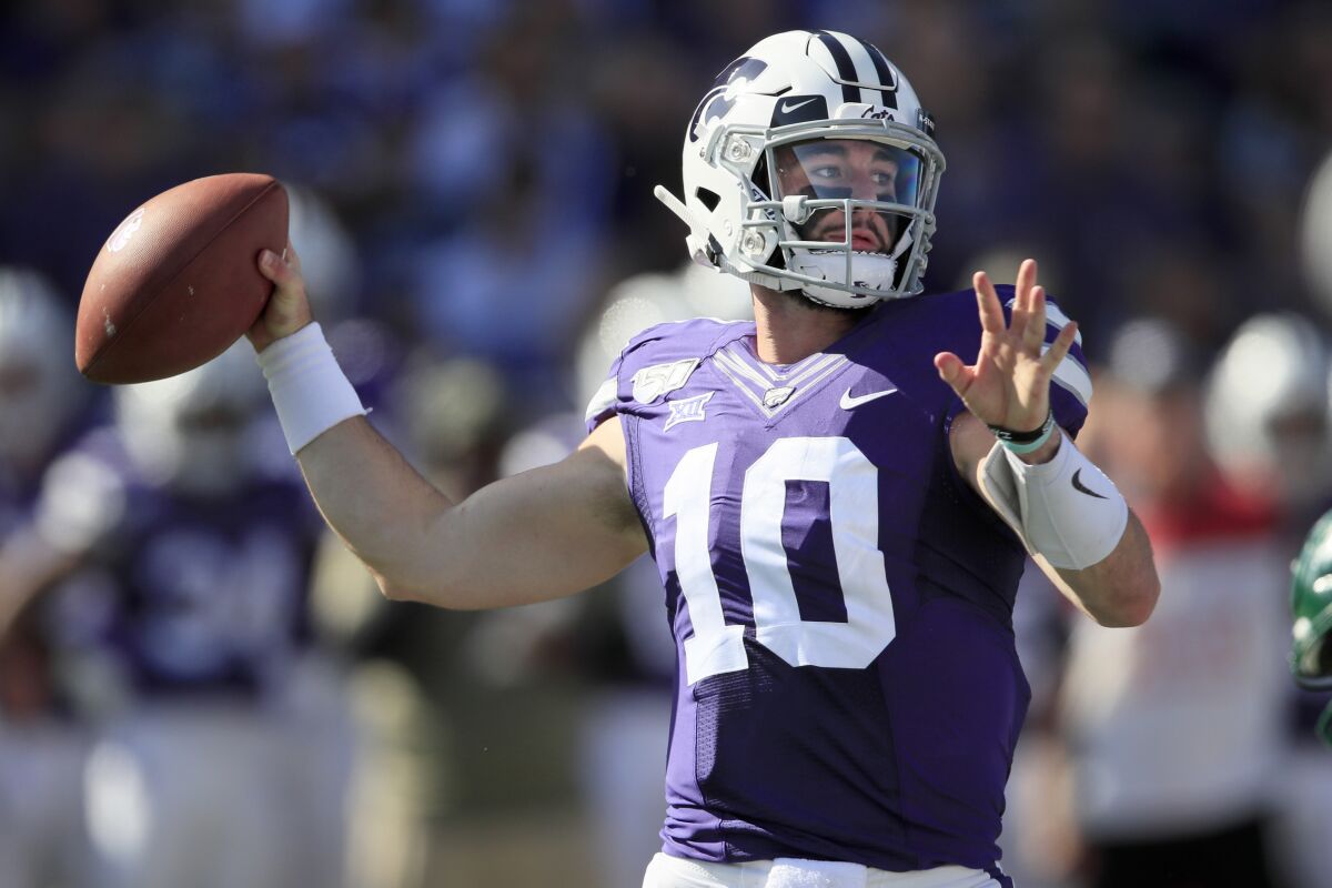 FILE - Kansas State quarterback Skylar Thompson passes to a teammate during the first half of an NCAA college football game against Baylor in Manhattan, Kan., Saturday, Oct. 5, 2019. Arkansas State plays at Kansas State on Saturday, Sept. 12, 2020. (AP Photo/Orlin Wagner, File)