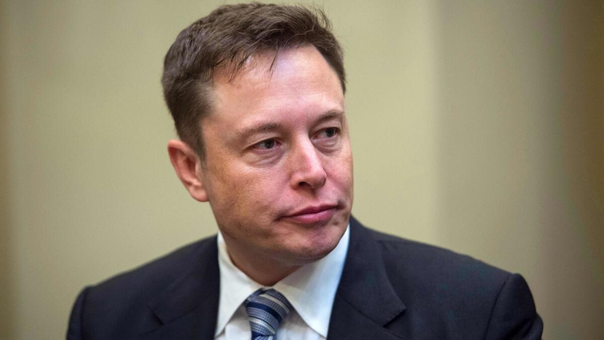 Tesla CEO Elon Musk, shown in January 2017, said working fewer hours and getting more sleep is not an option for him.