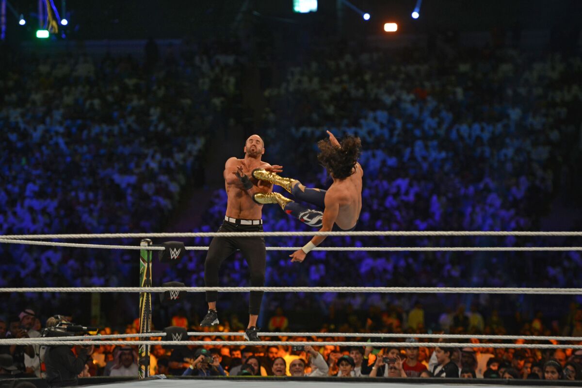 Mansoor delivers a flying kick to Cesaro during a WWE performance from Riyadh, Saudi Arabia, on Oct. 31, 2019.