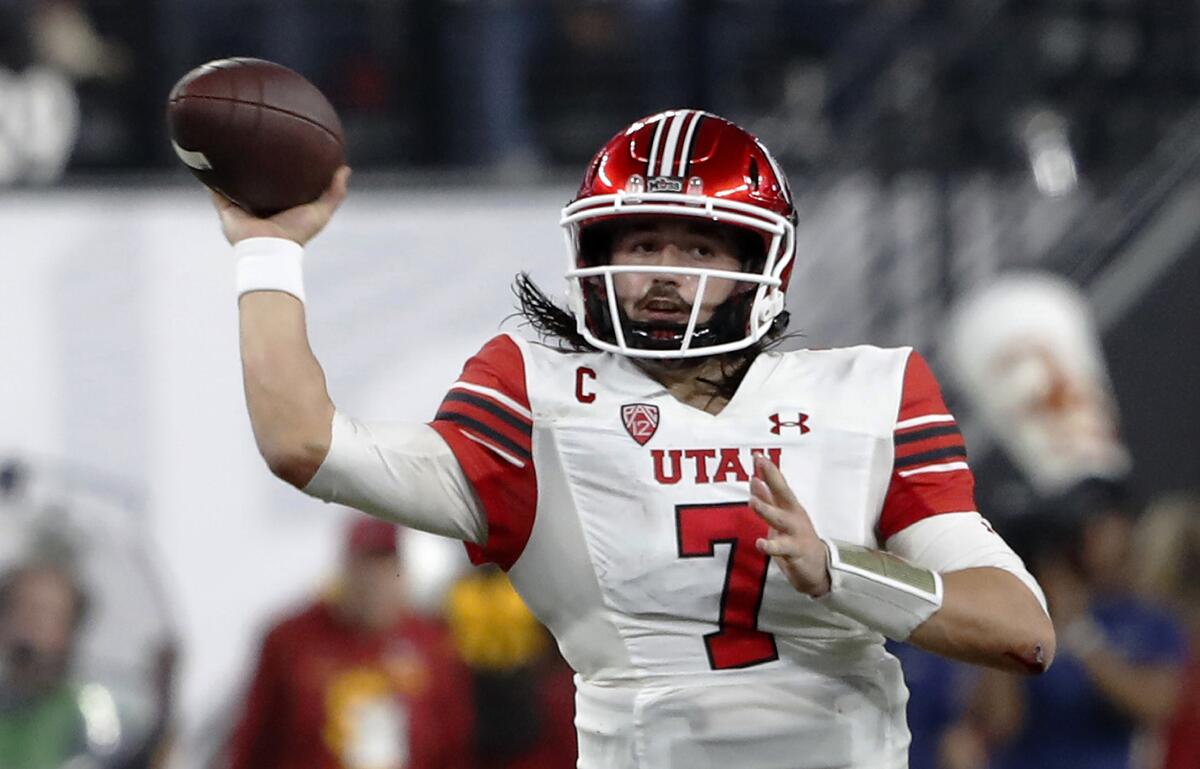 Utah quarterback Cameron Rising throws a pass against USC during the Pac-12 title game.