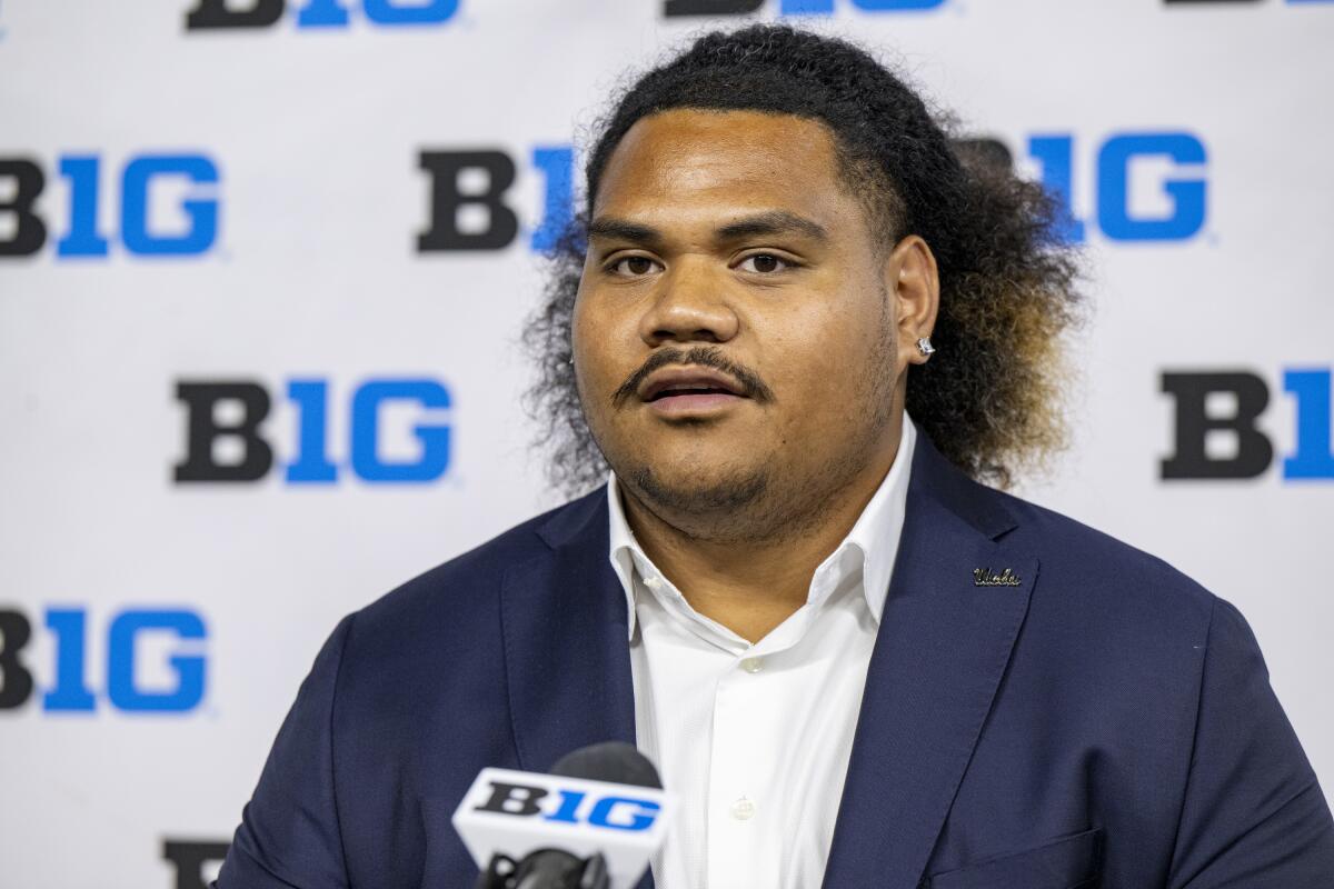 UCLA's Jay Toia talks with reporters during Big Ten conference media days at Lucas Oil Stadium on July 24.