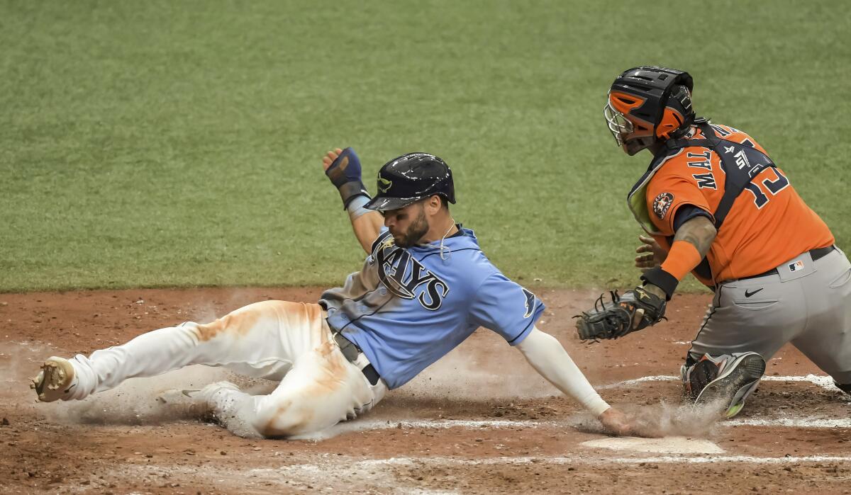 Meadows, Margot lead Rays over Astros 5-4 to avoid sweep