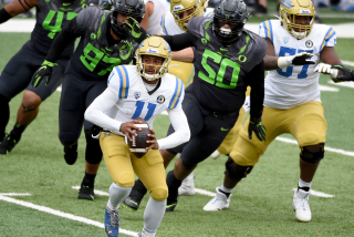 EUGENE, OREGON - NOVEMBER 21: Chase Griffin #11 of the UCLA Bruins.
