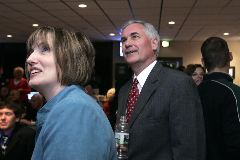 State Sen. Tom McClintock, the Republican candidate for the 4th Congressional District, and his wife, Lori, left, smile as they watch election returns are posted at his election night party in Roseville, Calif., Tuesday, Nov. 4, 2008. McClintock is in a tight race against Democrat Charlie Brown.(AP Photo/Rich Pedroncelli)