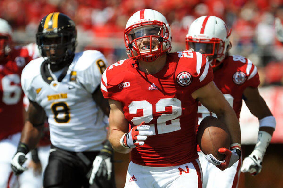 Nebraska running back Rex Burkhead has a sprained ligament in his left knee and is questionable for Saturday's game against UCLA at the Rose Bowl.