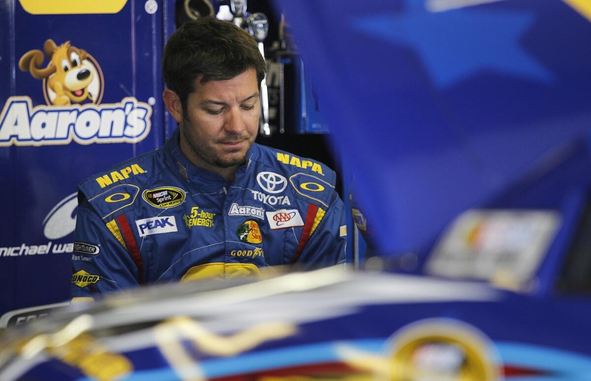 Martin Truex Jr. was one of three drivers from Michael Waltrip Racing penalized after at Richmond (Va.) International Raceway that determined which drivers would qualify for NASCAR's Chase for the Cup.