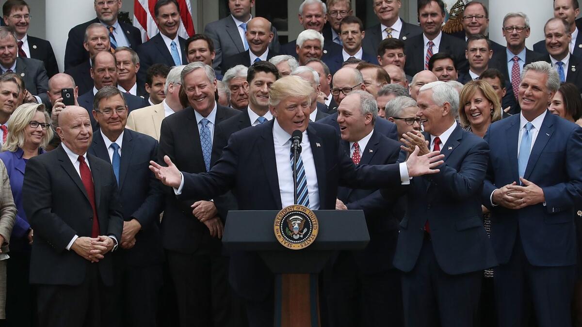 President Trump celebrates with Republicans at the White House on Thursday after the House passed its version of the American Health Care Act.