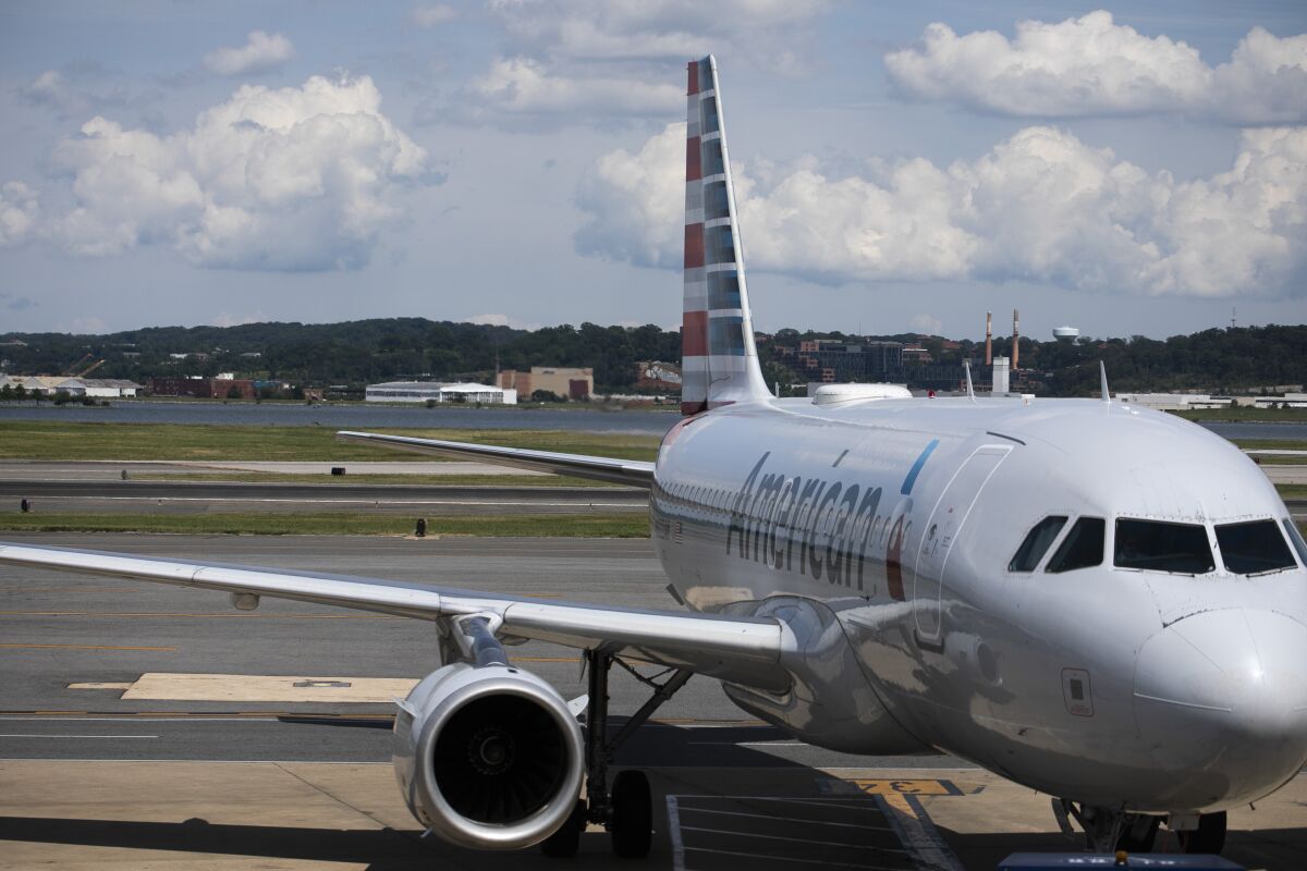 An American Airlines plane parked at an airport