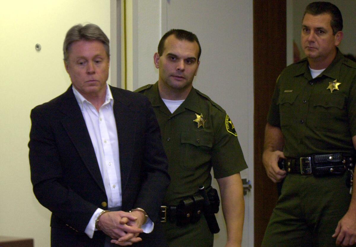 Edward Allaway is escorted into court by Orange County deputies in 2001.