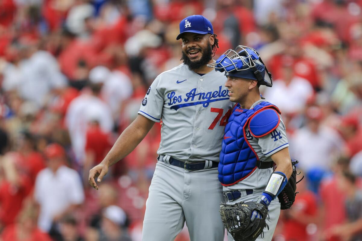 Kenley Jansen hugs Austin Barnes after a final out.