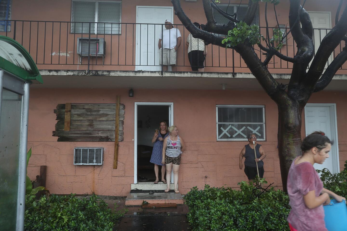 People ride out Hurricane Irma in their apartments as it passes through Miami on Sept. 10, 2017.