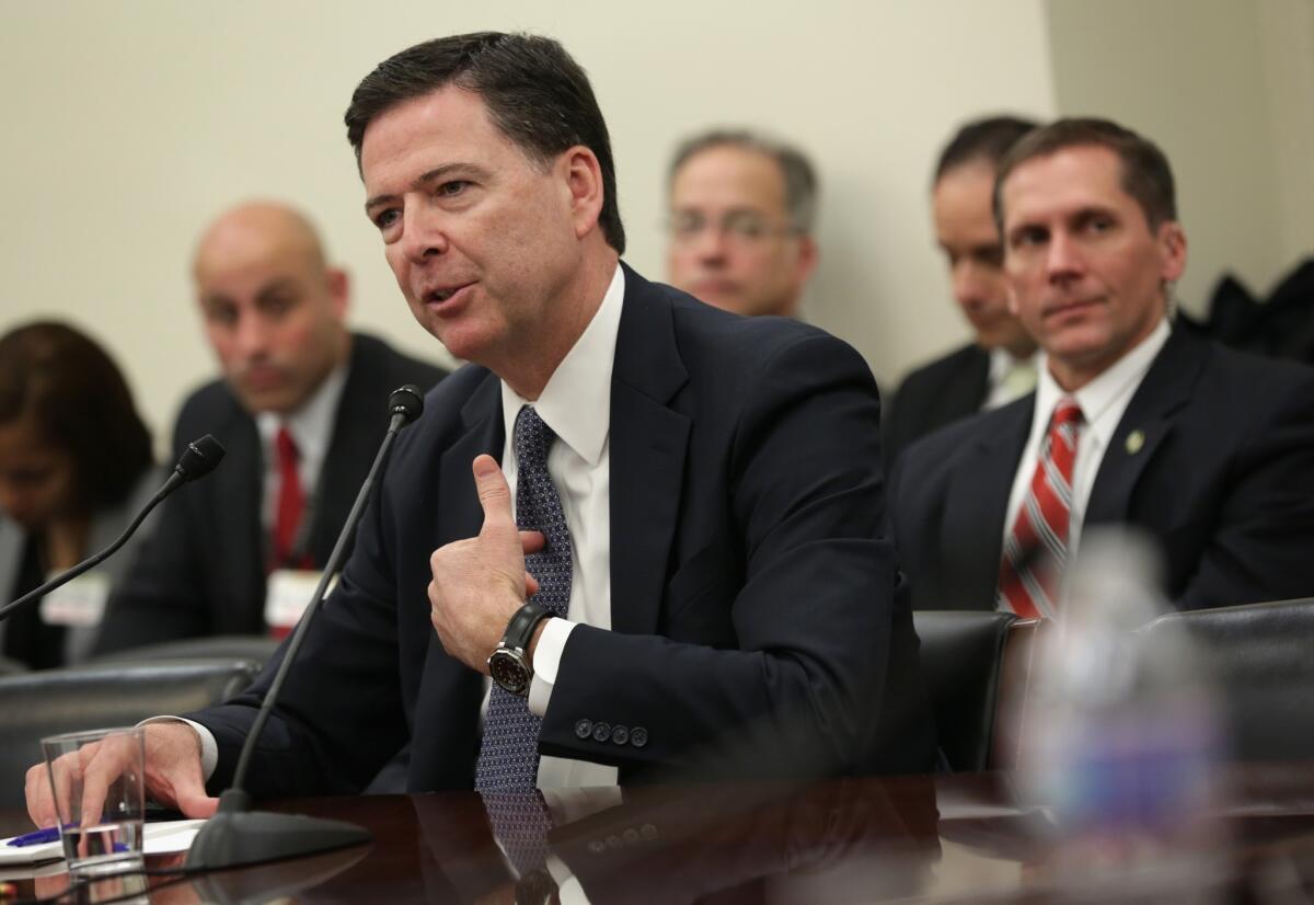 FBI Director James B. Comey testifies Wednesday during a hearing on Capitol Hill in Washington.
