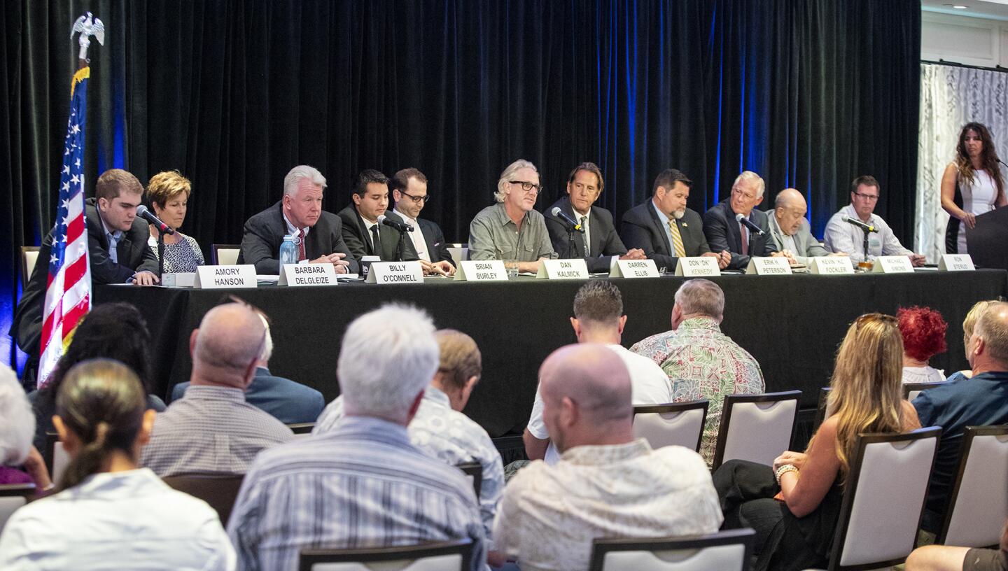 Eleven candidates for the Huntington Beach City Council participate in a forum at the Waterfront Beach Resort on Tuesday.