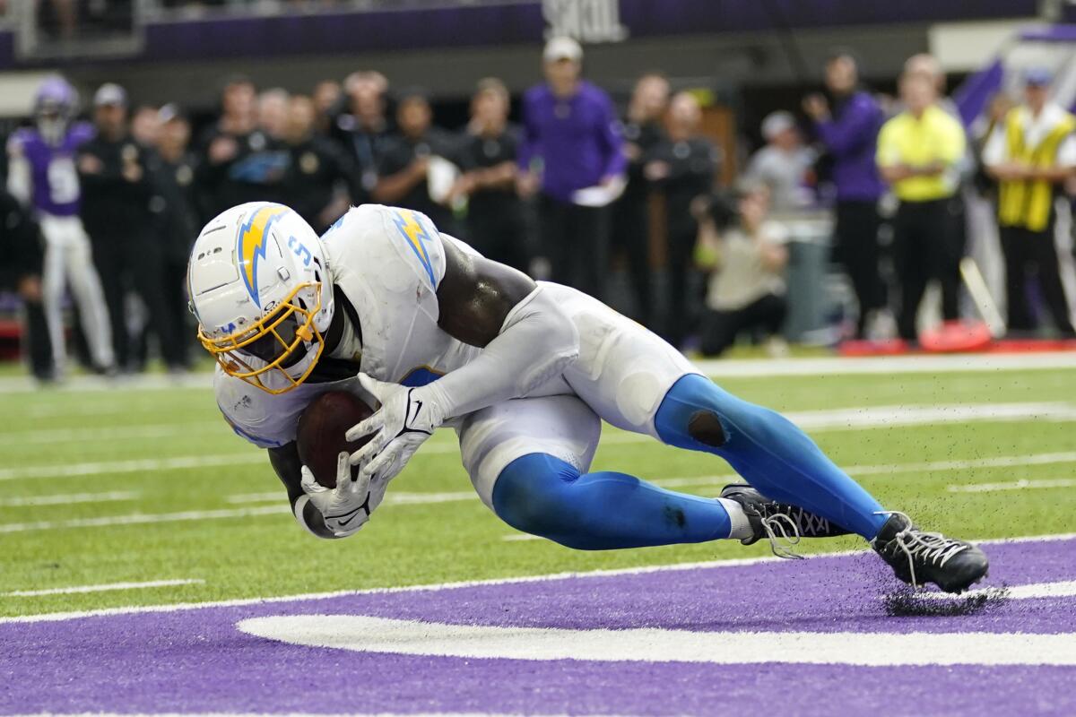 Kenneth Murray Jr. intercepts a pass in the end zone in the waning seconds to save the Chargers' win over the Vikings.