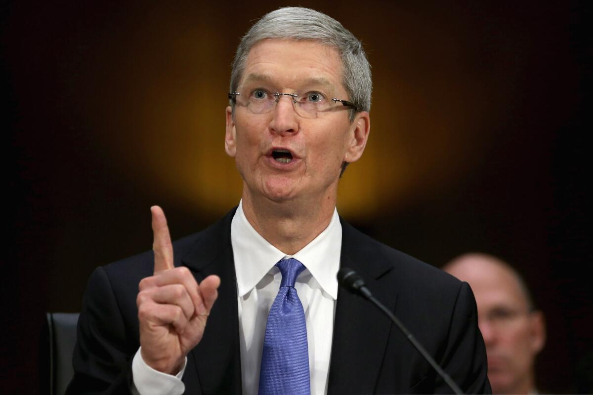 Apple CEO Tim Cook testifies in Washington before a Senate panel examining how multinational corporations shift profits offshore.