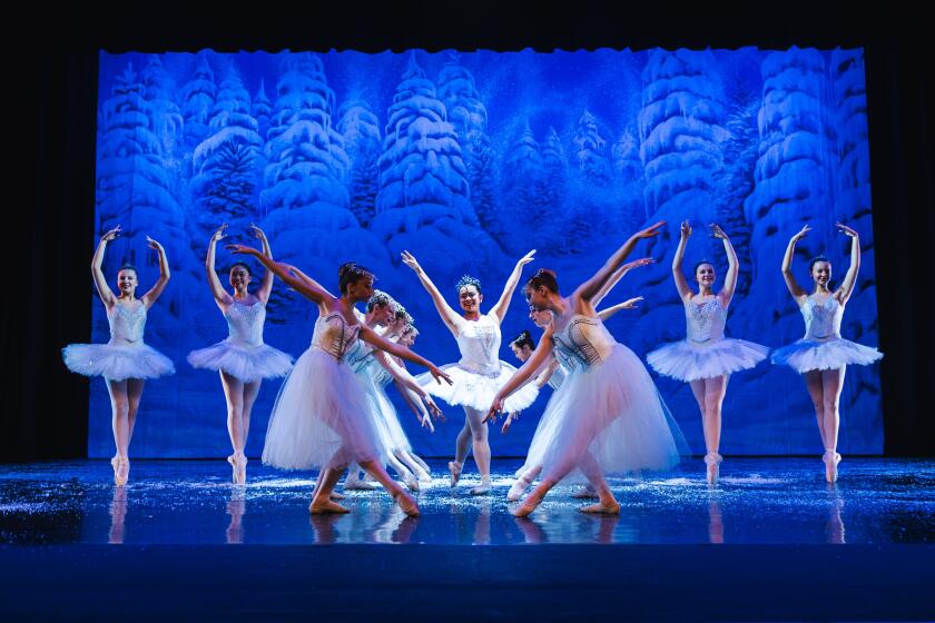 Etudes Ballet performs "The Nutcracker" with Snow Queen Makayla Arakaki, center, at Huntington Beach High School Auditorium.