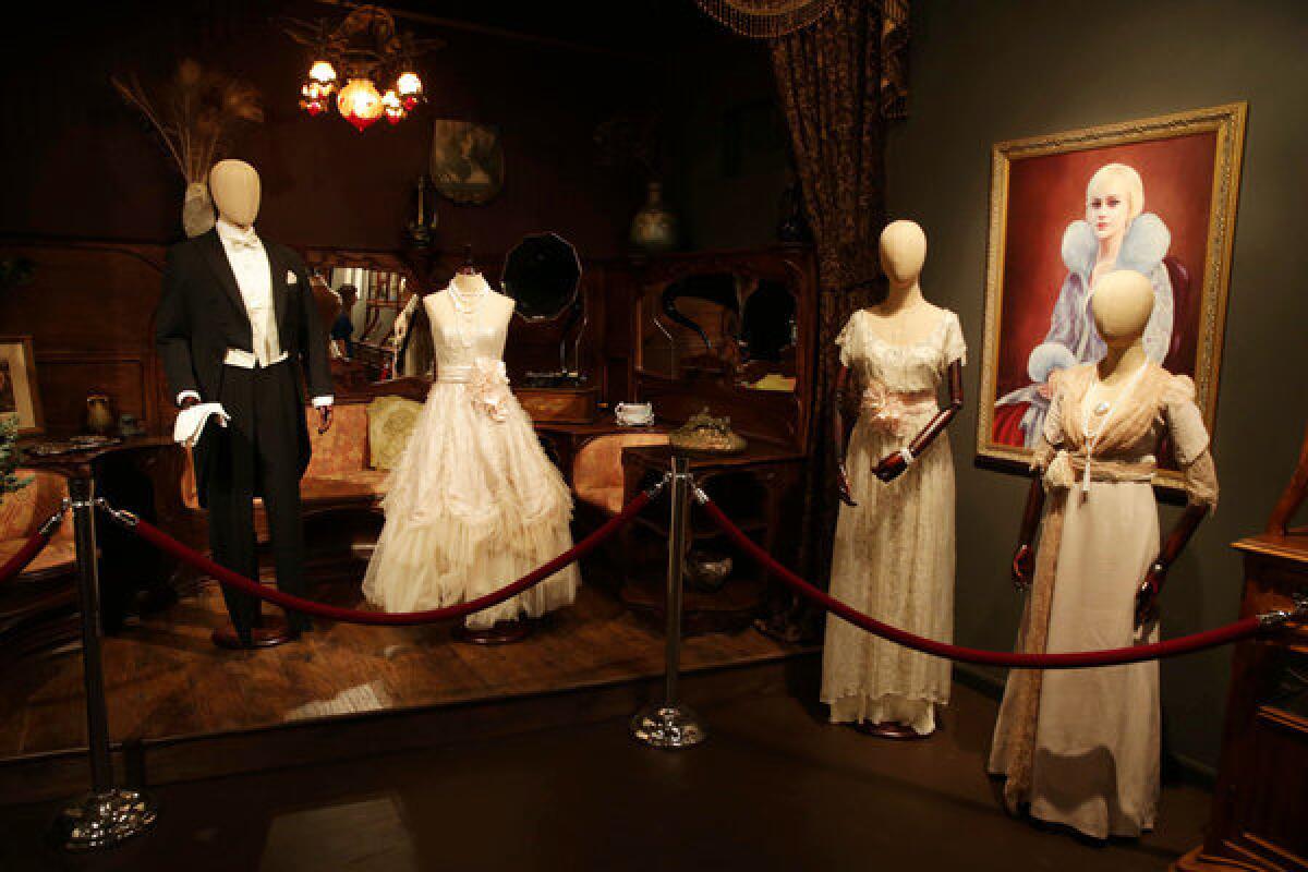 Four of the "Great Gatsby" costumes on display at an upcoming gallery show featuring the work of production and costume designer Catherine Martin.