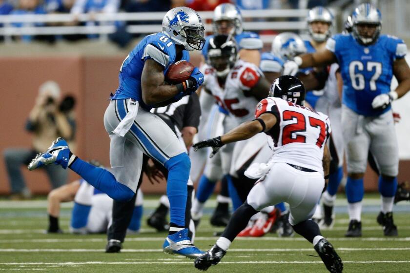 Detroit Lions receiver Calvin Johnson catches a pass against the Atlanta Falcons.