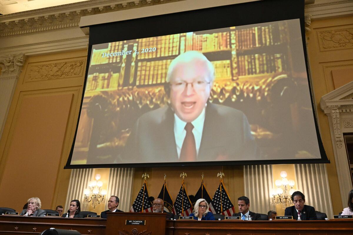 John Eastman, a former lawyer for Donald Trump, appears on screen during a House Jan. 6 committee hearing in 2022.