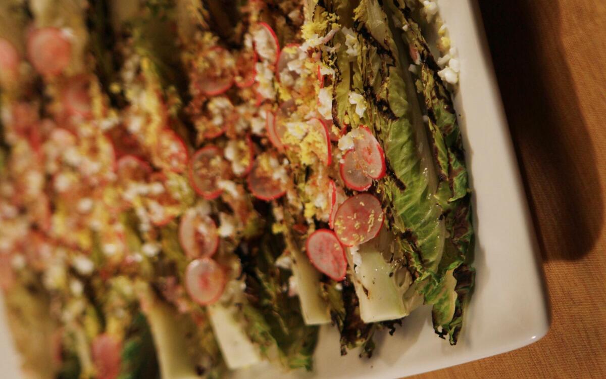 Grilled romaine with radishes, hard-boiled eggs and toasted bread crumbs
