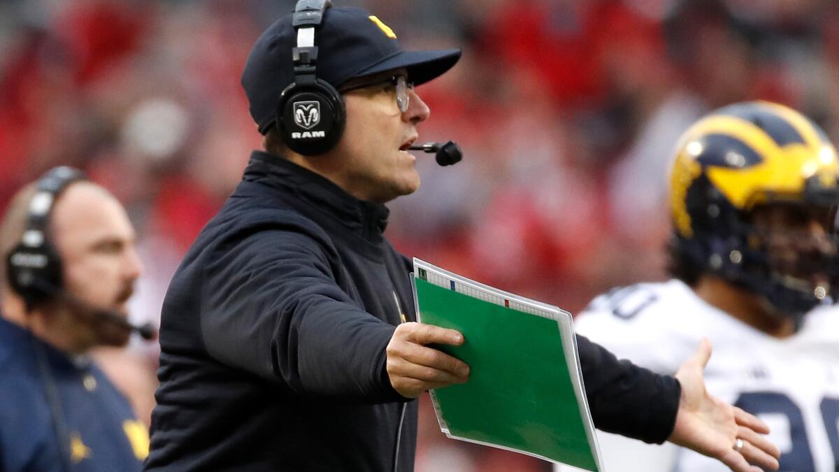 Michigan Coach Jim Harbaugh is like many college football fans: He's not sure who belongs in the College Football Playoff.