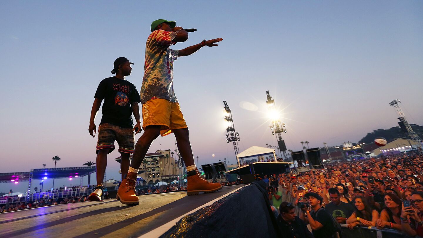 Shay Haley, left, and Pharrell Williams of the band N.E.R.D perform at KAABOO Del Mar on Saturday, September 15, 2018. (Photo by K.C. Alfred/San Diego Union-Tribune)