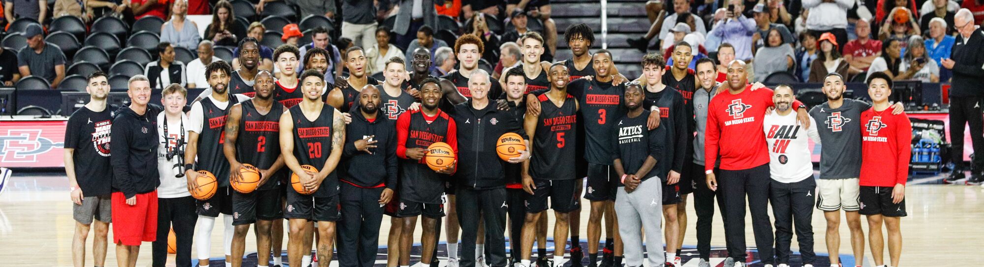 Houston, Texas - March 31: San Diego State players pose for a team photo during a practice leading up to the Final Four at the NRG Stadium on Friday, March 31, 2023 in Houston, Texas. (Meg McLaughlin / The San Diego Union-Tribune)