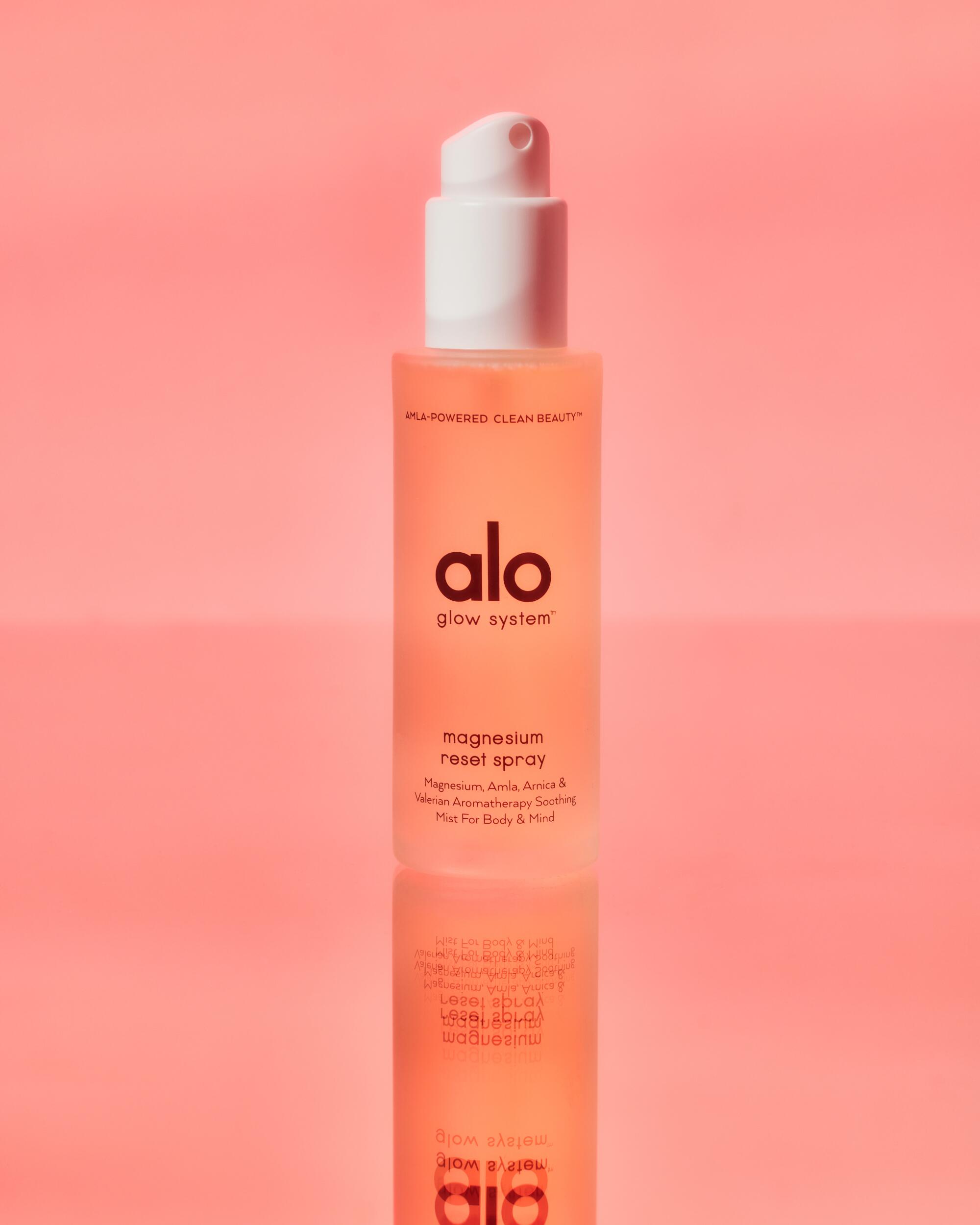 Magnesium Reset Spray by Alo Yoga, to spray on tense muscles or the soles of your feet before going to bed.
