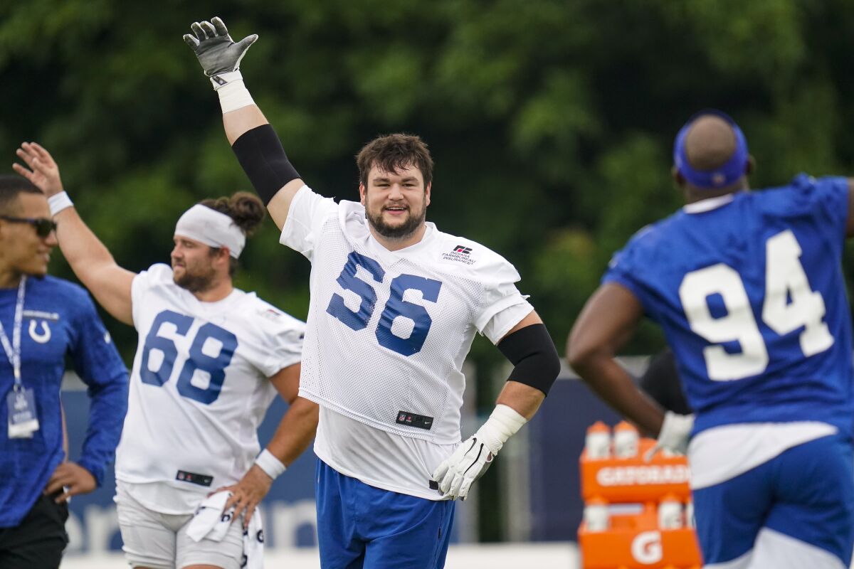 Indianapolis Colts guard Quenton Nelson warms up during practice at the NFL team's football training camp in Westfield, Ind., Thursday, July 29, 2021. (AP Photo/Michael Conroy)