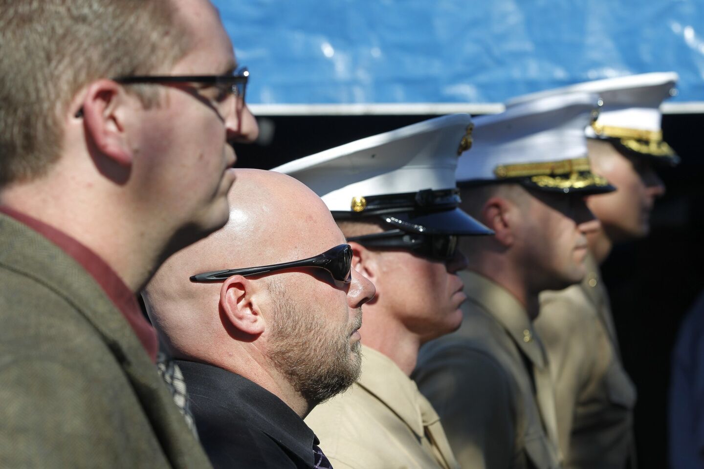 Vets and active duty Marines listen during the First Marine Division's commemorative ceremony for the Second Battle of Fallujah.
