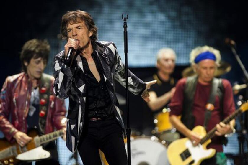 The Rolling Stones -- Ron Wood, left, Mick Jagger, Charlie Watts and Keith Richards -- perform at Staples Center in Los Angeles in 2013.