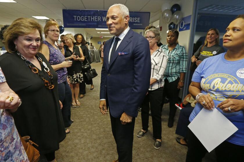 In this Sept. 7, 2018 photo, Mike Espy, a Democrat and President Bill Clinton's first agriculture secretary, speaks in Jackson, Miss., to supporters and volunteers in his campaign for November's special election to fill the unexpired term of U.S. Sen. Thad Cochran, R-Miss., who retired in April. He faces appointed Republican U.S. Sen. Cindy Hyde-Smith, R-Miss., Republican state Sen. Chris McDaniel, who almost unseated Cochran four years ago in the party's primary runoff, and Tobey Bernard Bartee, a former military intelligence officer who is also a Democrat. Party labels do not appear on the ballot. (AP Photo/Rogelio V. Solis)
